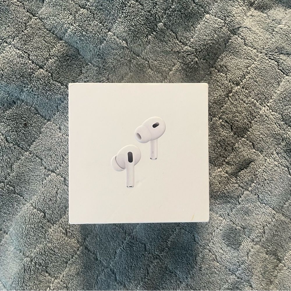 Apple White AirPods Pro box with ear tips